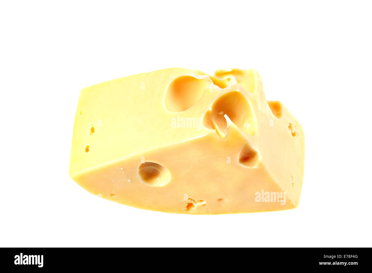 Swiss cheese piece isolated on white background Stock Photo