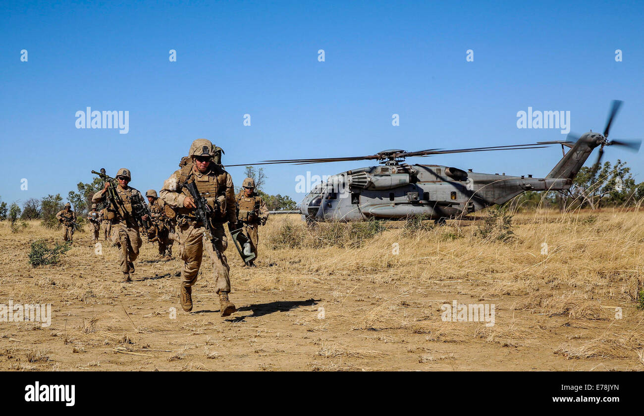 U.S. Marines with Bravo Company, 1st Battalion, 5th Marine Regiment conduct a helicopter insert during a live-fire exercise as part of Koolendong 2014 at Bradshaw Field Training Area, Australia, Aug. 28, 2014. Koolendong is an amphibious and live-fire exe Stock Photo