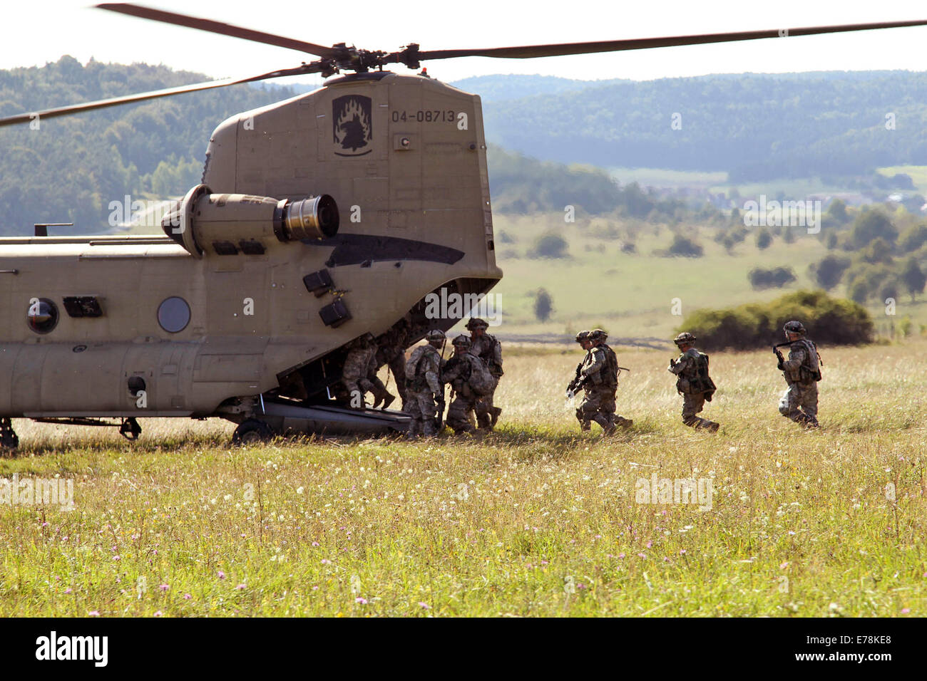 U.S. Army paratroopers with Alpha Company, 1st Battalion, 503rd Infantry Regiment, 173rd Airborne Brigade Combat Team participate in Saber Junction 2014 at Hohenfels Training Area in Germany Aug. 28, 2014. Saber Junction is a U.S. Army Europe-led exercise Stock Photo