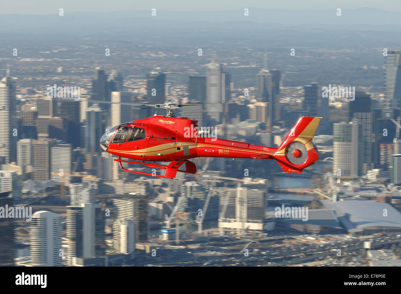 Eurocopter EC130B4 in flight over Melbourne, Australia Stock Photo