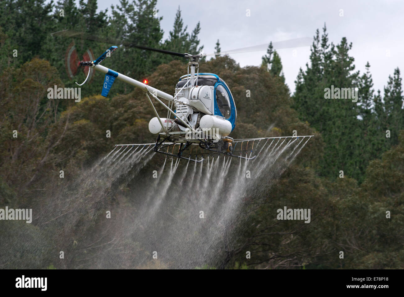 Flight conducting aerial spraying Stock Photo