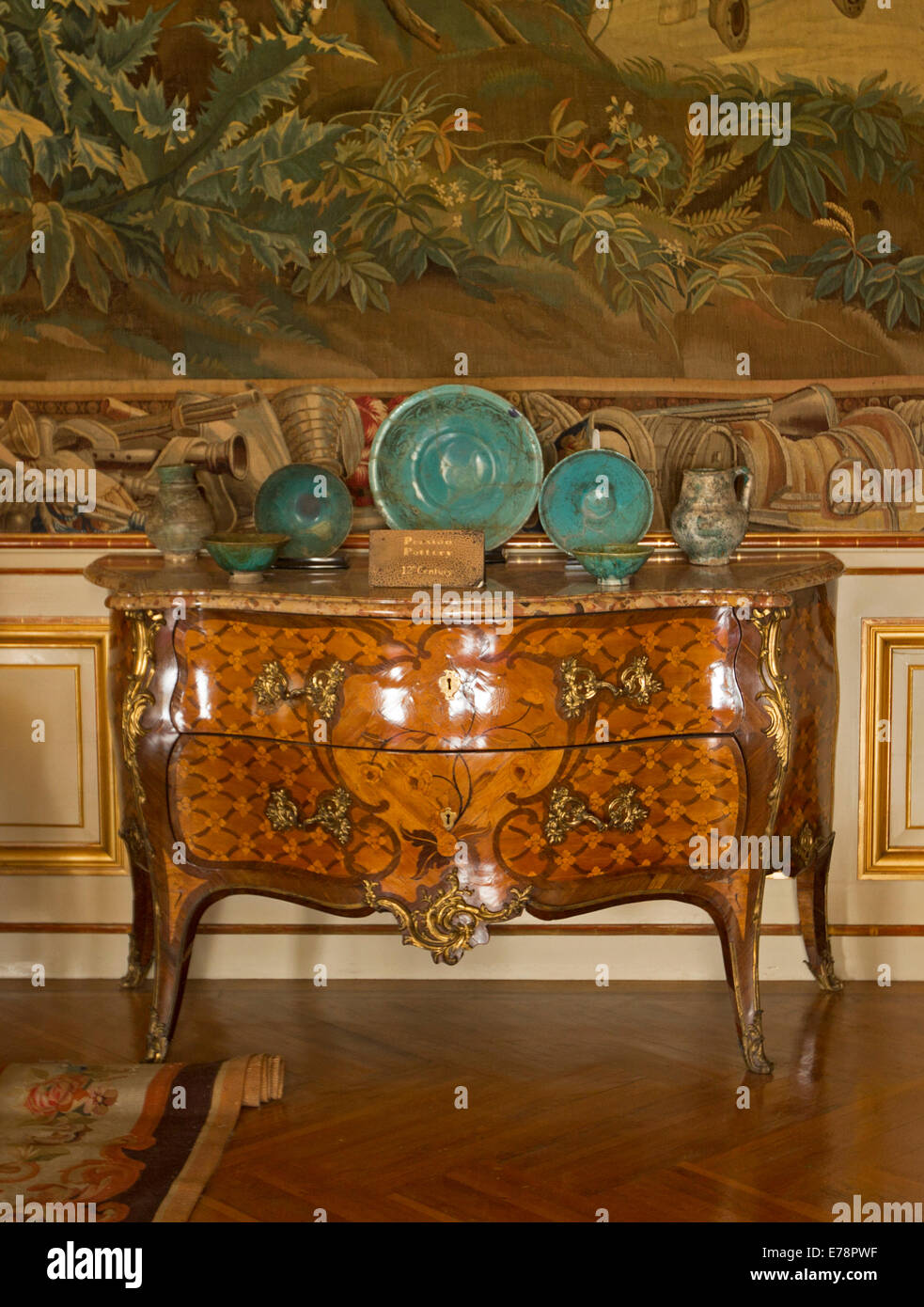 Elegant antique timber furniture with inlaid marquetry in intricate
