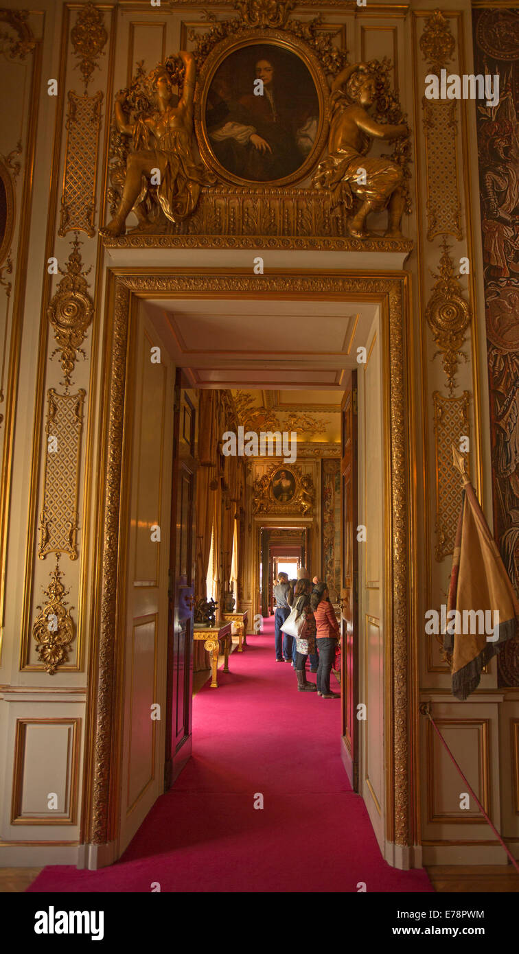 Grand hallway with gold decoration, and red carpet at Blenheim Palace, England Stock Photo