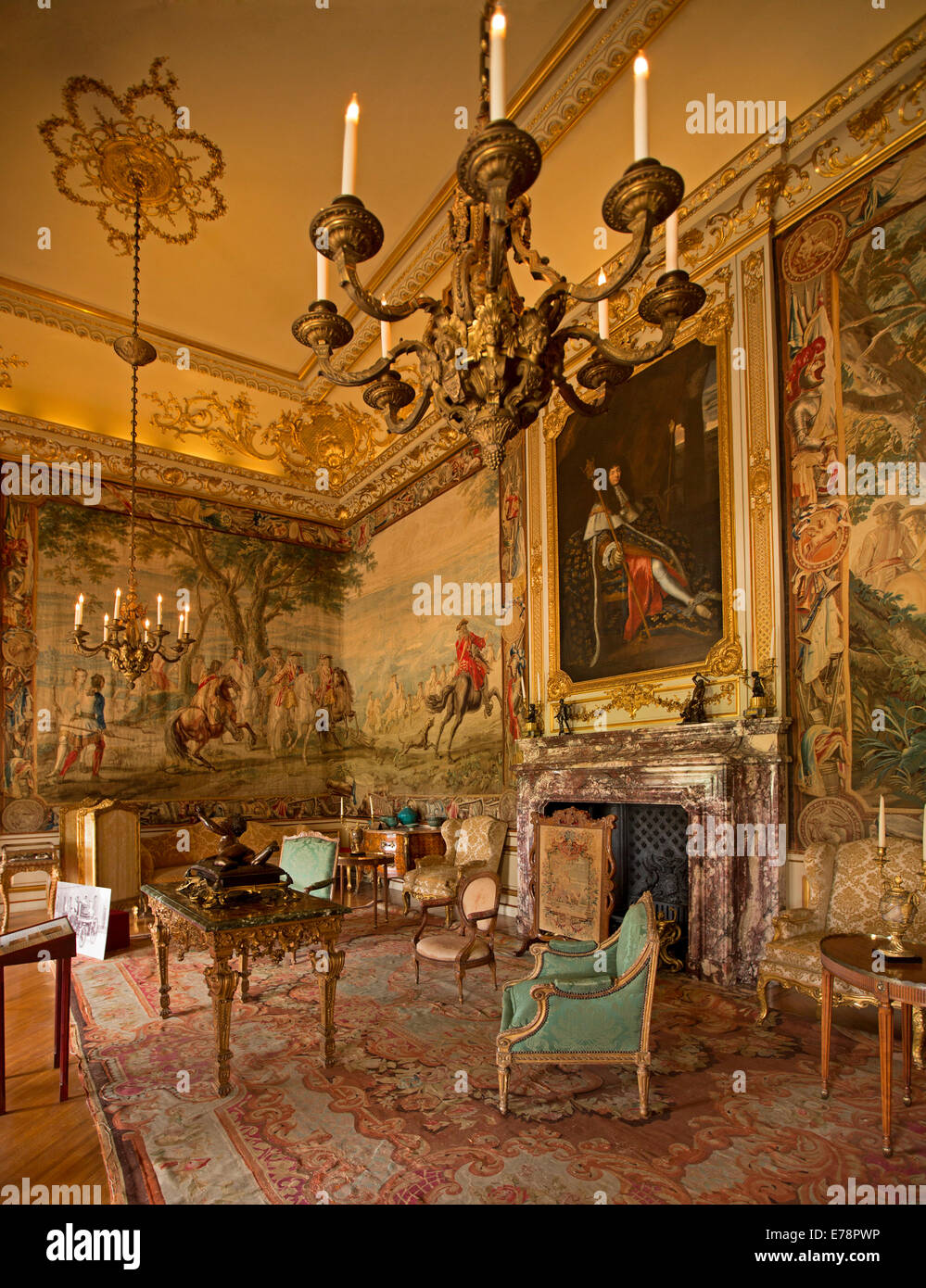 Grand interior room with immense paintings,luxurious furnishings, chandelier and ornate ceiling at Blenheim Palace, England Stock Photo