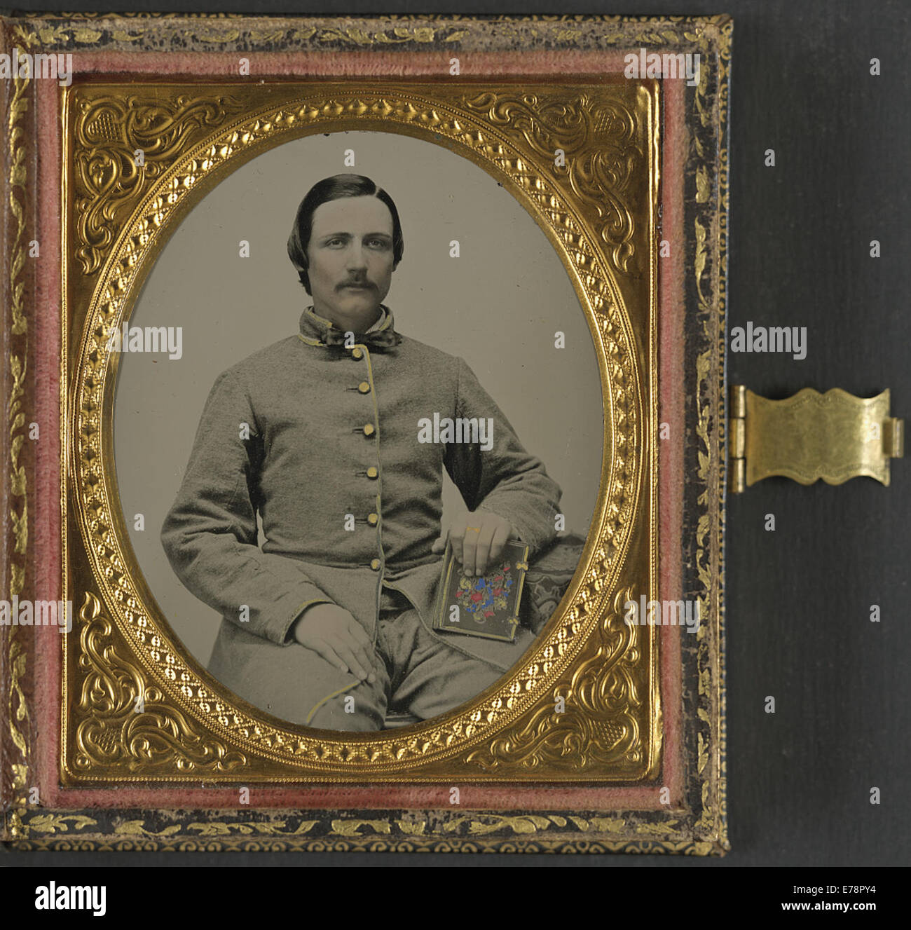 [Unidentified soldier in Confederate uniform with photograph case] Stock Photo