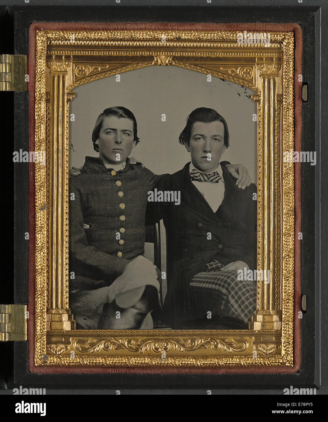 [Unidentified soldier in Confederate uniform and unidentified man Stock Photo