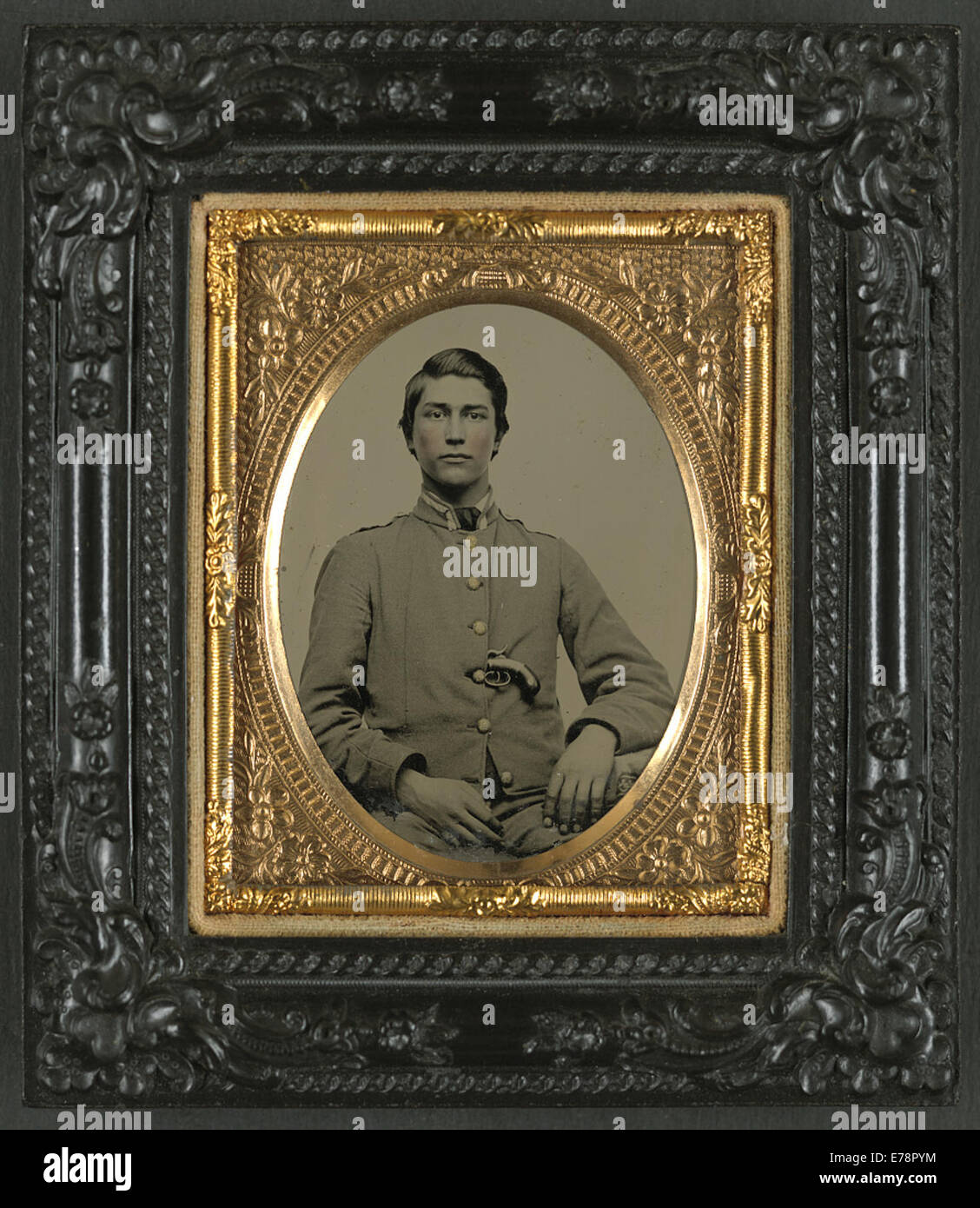 [Unidentified soldier in Confederate uniform with percussion pistol] Stock Photo