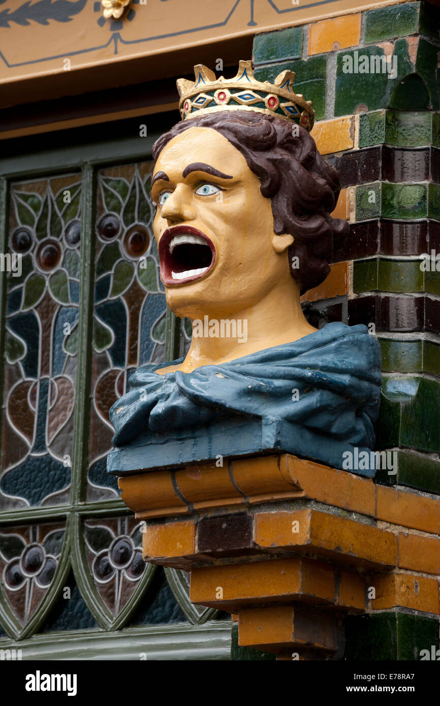 Statue of a Crowned 'Gaaper' on the facade of the Apotheek De Groote Gaaper (Drugstore), Zuidersee Museum, North Holland Stock Photo