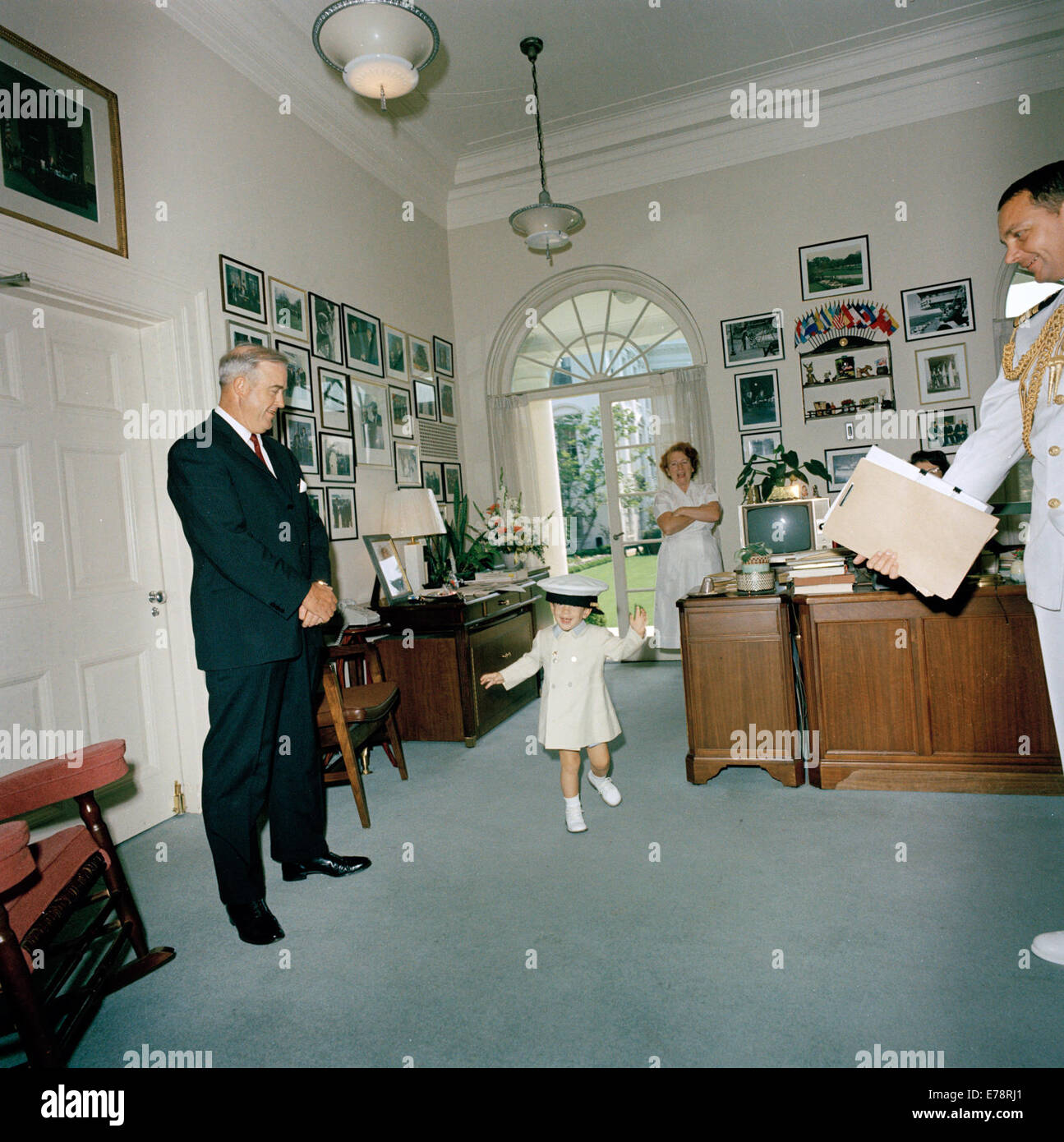 John F Kennedy, Jr Plays with Hat in White House Stock Photo