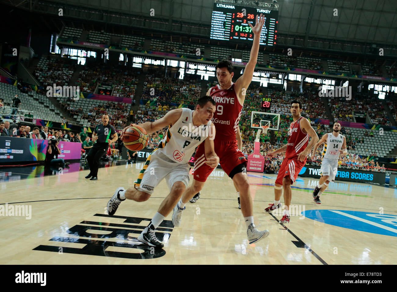 Barcelona, Spain. 9th Sep, 2014. Jonas Maciulis (L) of Lithuania drives the ball in front of Emir Preldzic of Turkey during the quarterfinal match at the 2014 FIBA Basketball World Cup Spain, in Barcelona, Spain, on Sept. 9, 2014. Credit:  Pau Barrena/Xinhua/Alamy Live News Stock Photo
