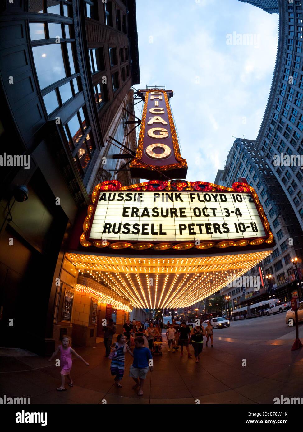 A fisheye, wide angle view of the famous Chicago Theatre marquee and people on State Street in the Loop District of Chicago. Stock Photo