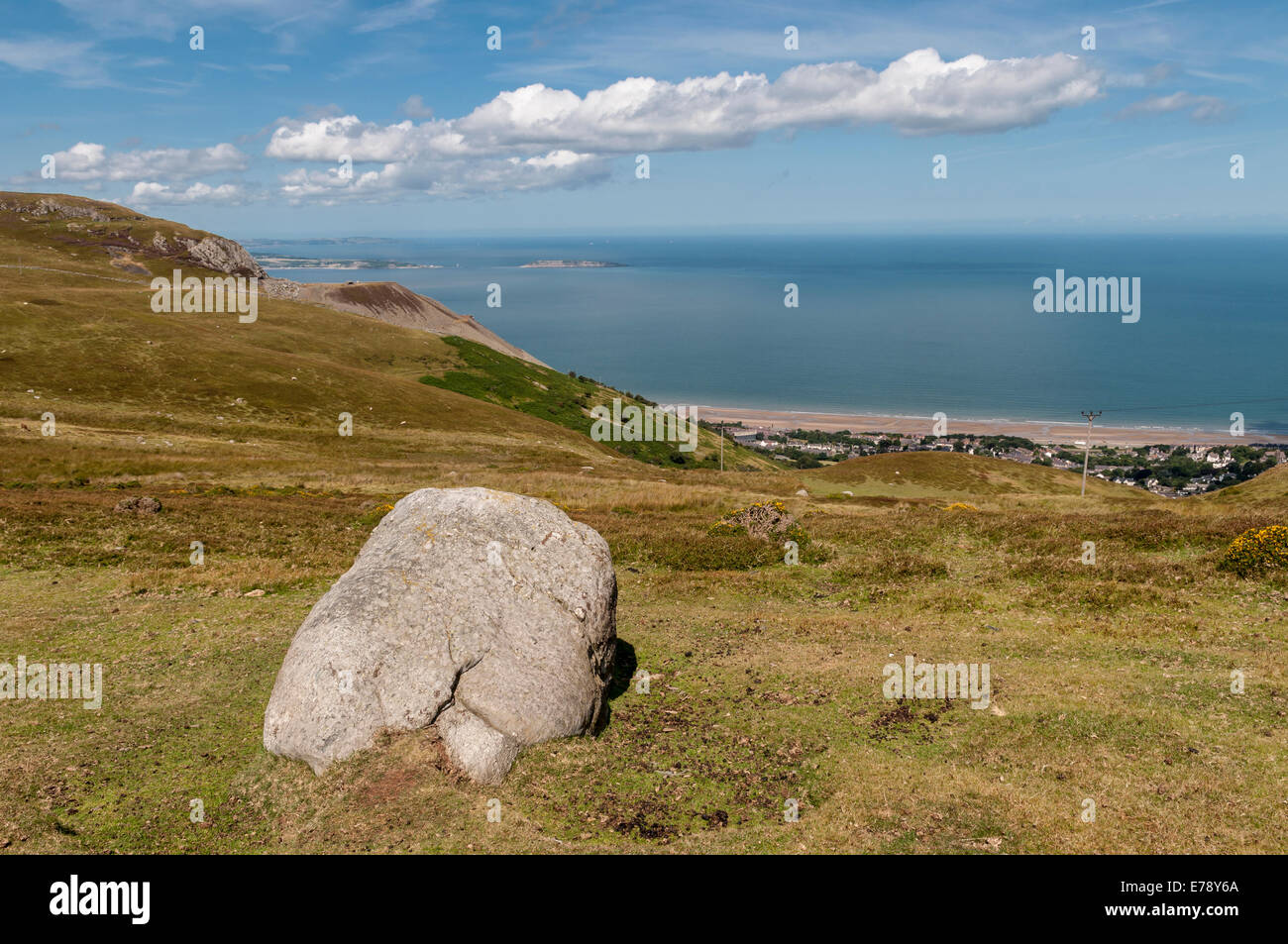 Views from Meini Hirion Druid's Circle above Penmaenmawr North Wales to the coast and hills in the surrounding area. Stock Photo