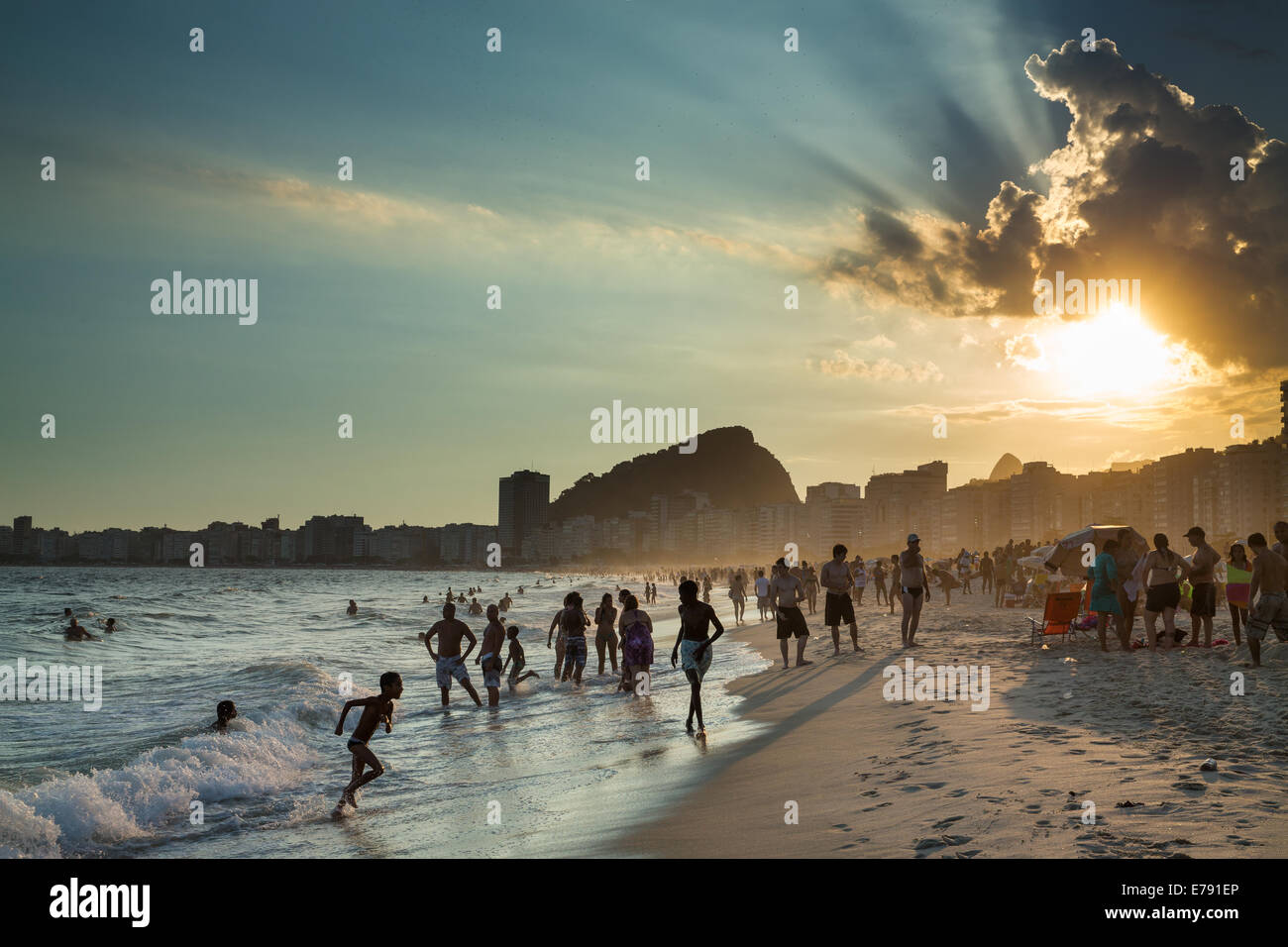 bathers and people relaxing on the Copacabana Beach, Rio de Janeiro, Brazil Stock Photo