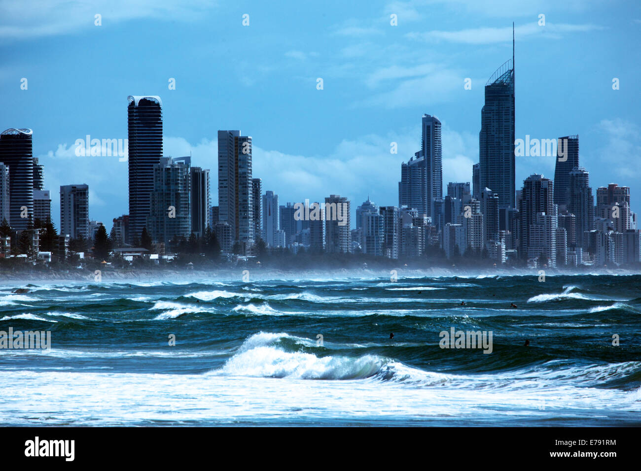 Looking across the Pacific Ocean towards the high rise buildings of Surfers Paradise in Australia Stock Photo