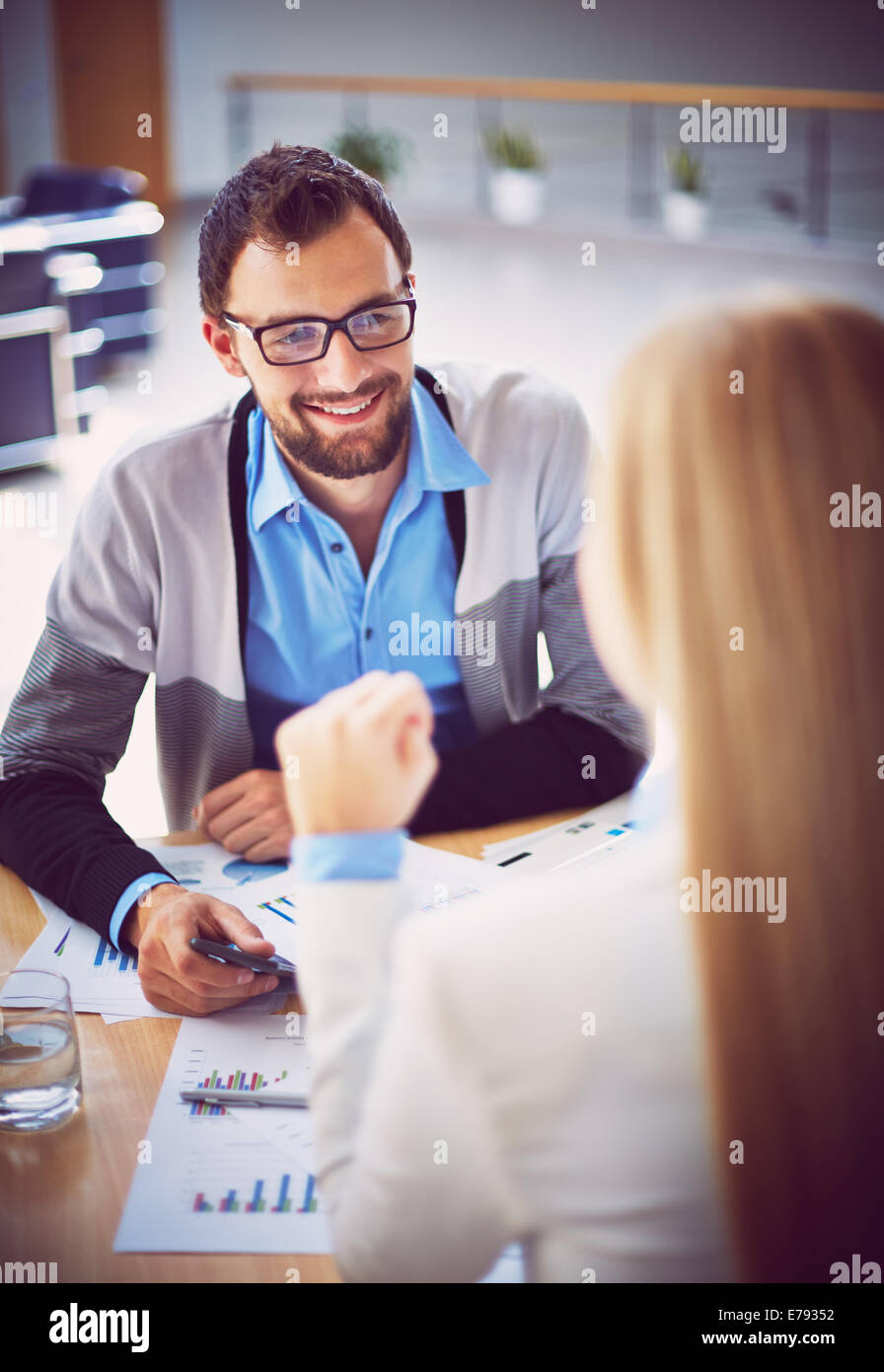 Handsome manager recruiting new workers in office Stock Photo - Alamy