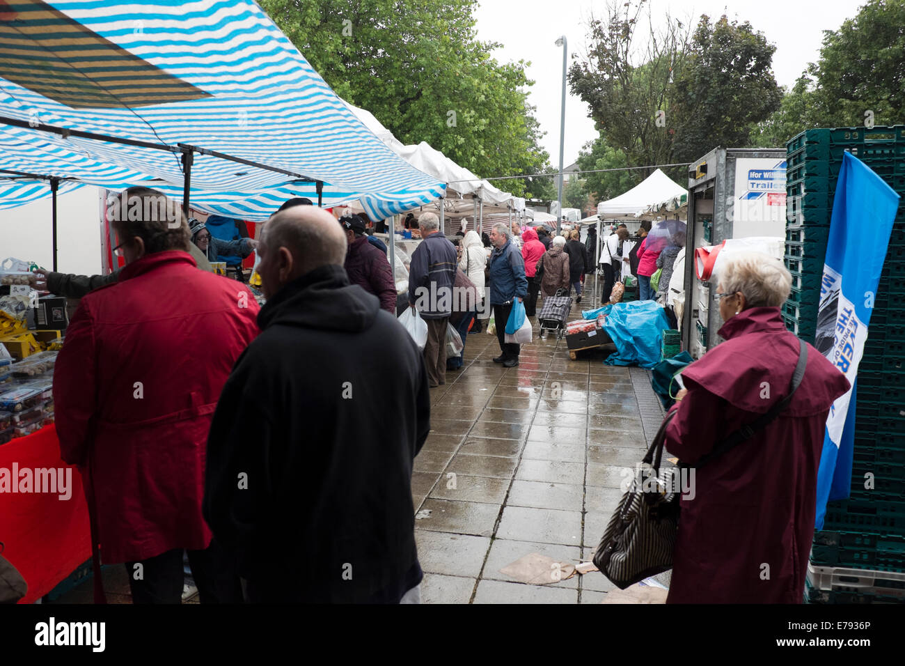 Wet Windy Raining Farmers Market Stalls Shopping Stock Photo