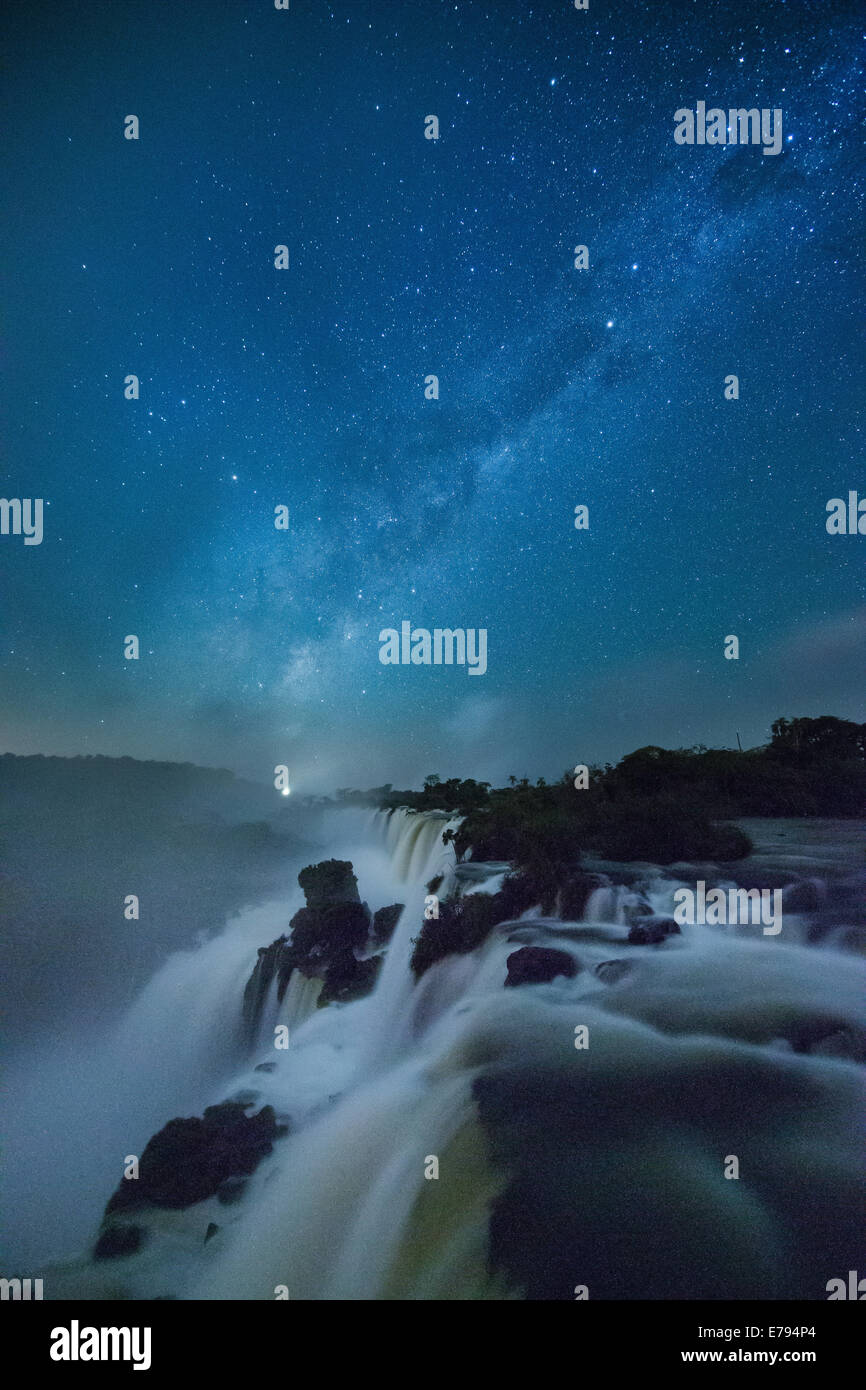 the Milky Way over Iguazu Falls at night, Argentina Stock Photo