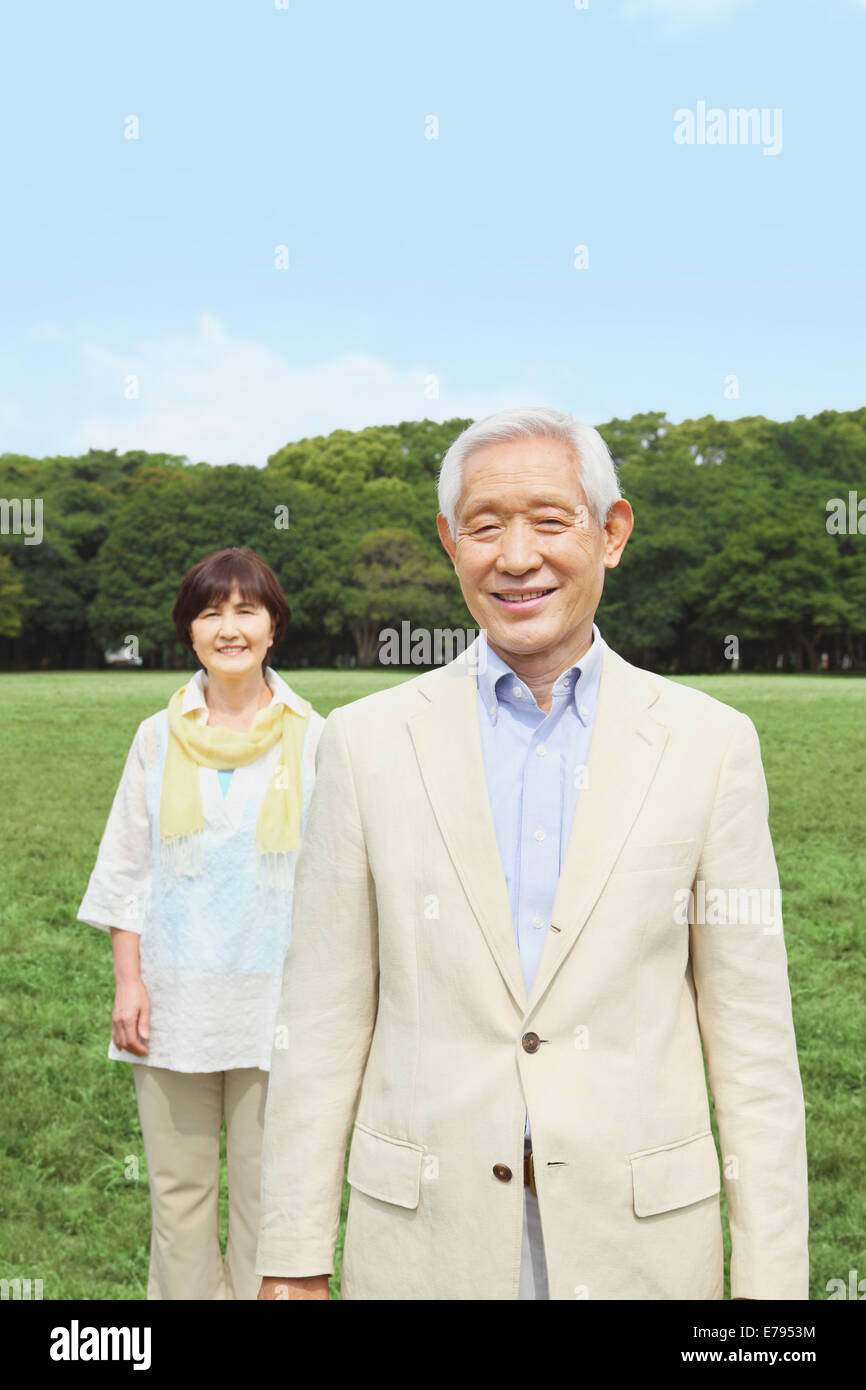 Senior adult Japanese couple in a park Stock Photo - Alamy