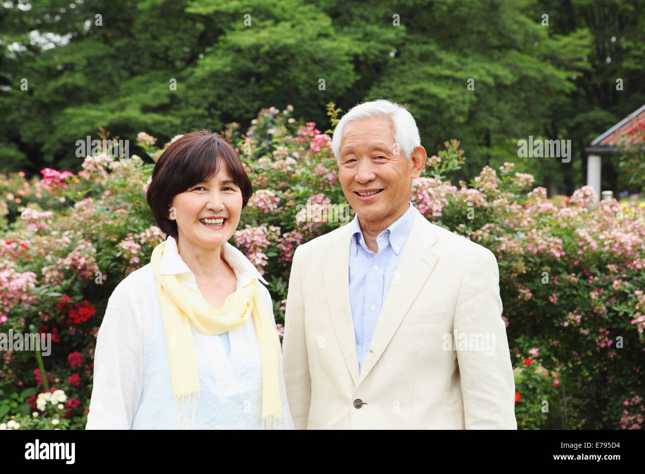 Senior adult Japanese couple in a park Stock Photo - Alamy