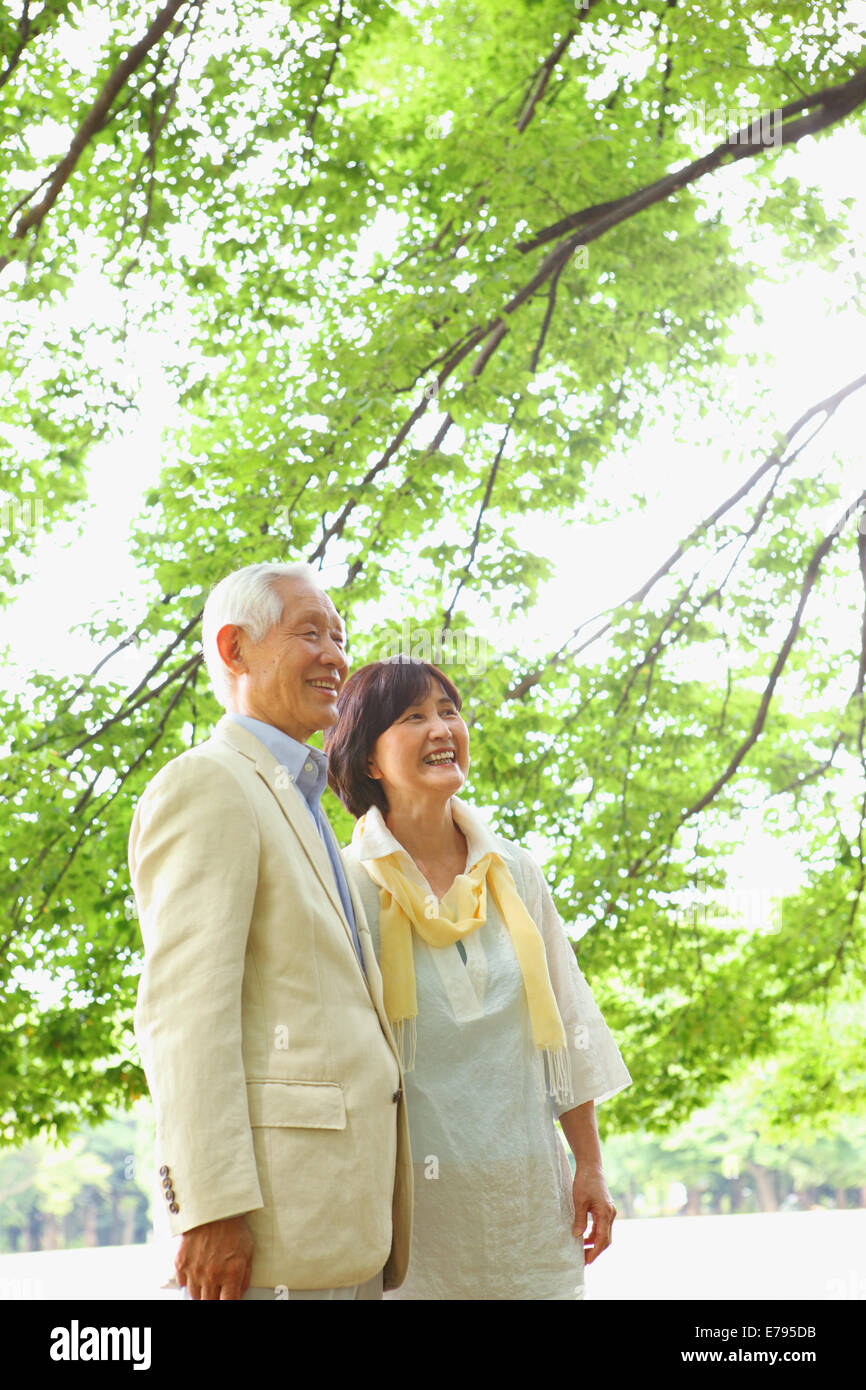 Senior adult Japanese couple in a park Stock Photo - Alamy