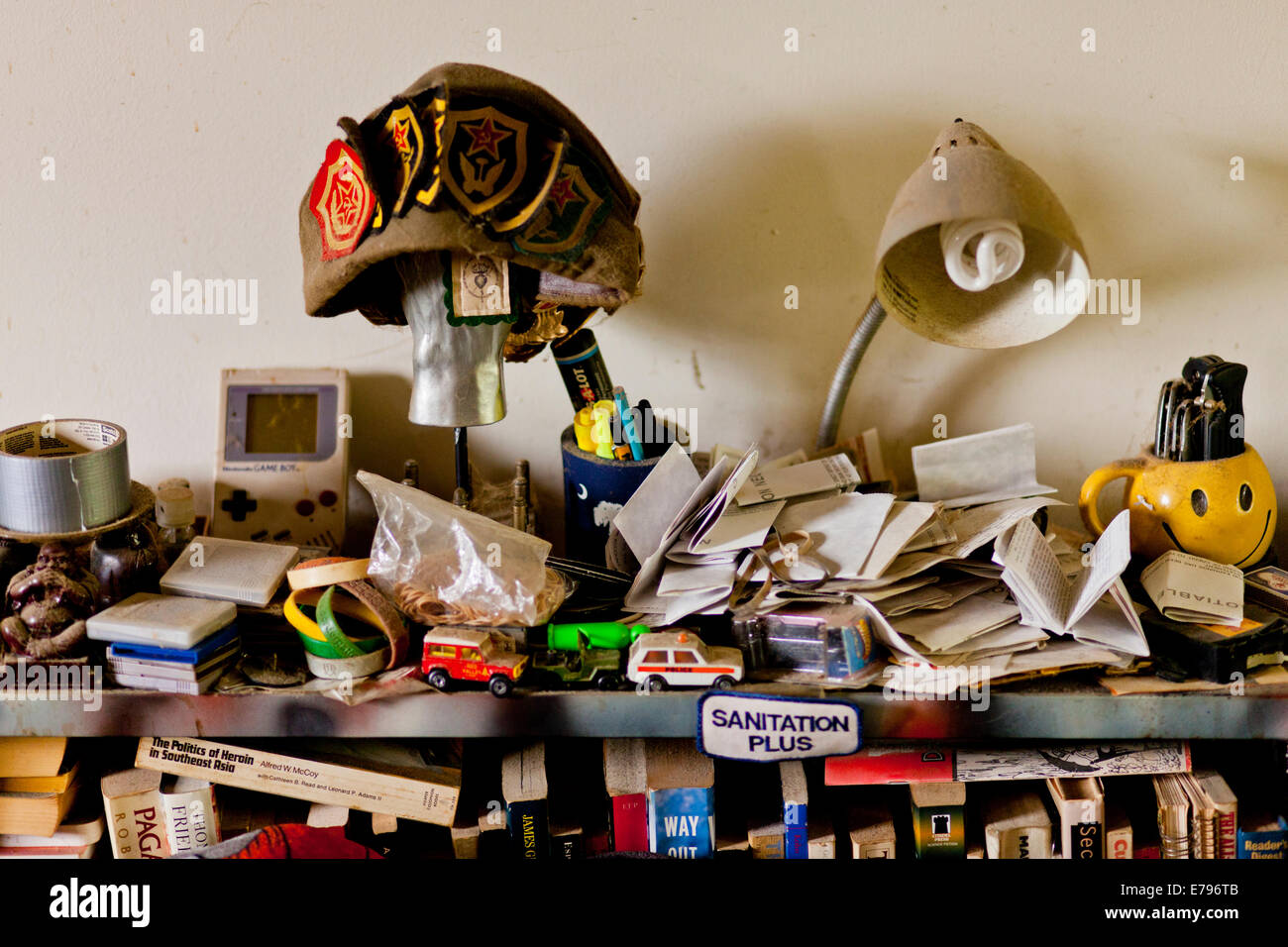 Cluttered shelf in a home Stock Photo