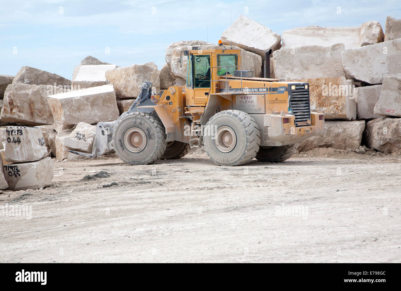Heavy machinery in a working quarry, Isle of Portland, Dorset, England Stock Photo