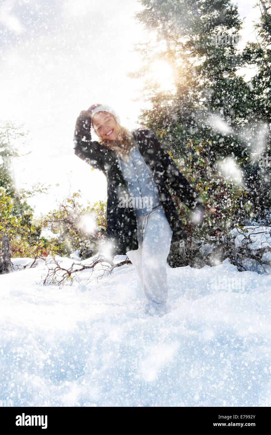 Portrait of young beautiful woman on winter outdoor background Stock Photo