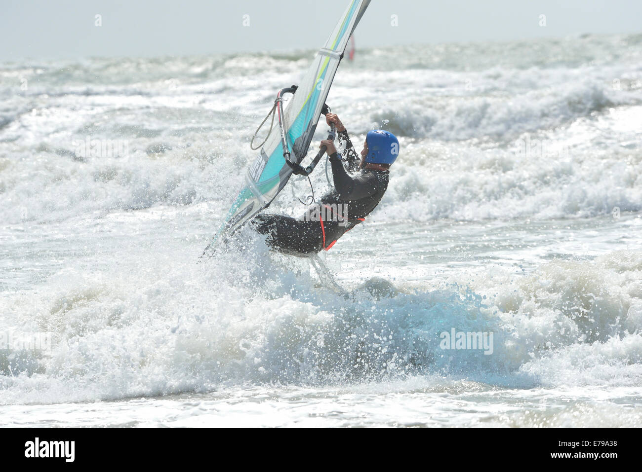 Windsurfer on a wild and windy day at West Wittering Beach, Nr. Chichester, West Sussex, England, UK Stock Photo