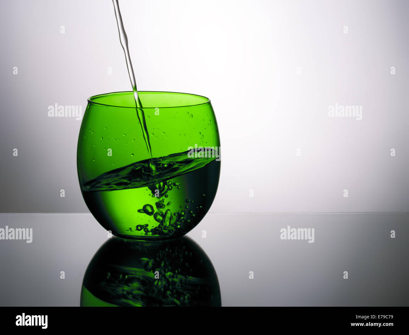 Not your ordinary glass of water! Unusual point of view, new angle metaphor etc. Stock Photo