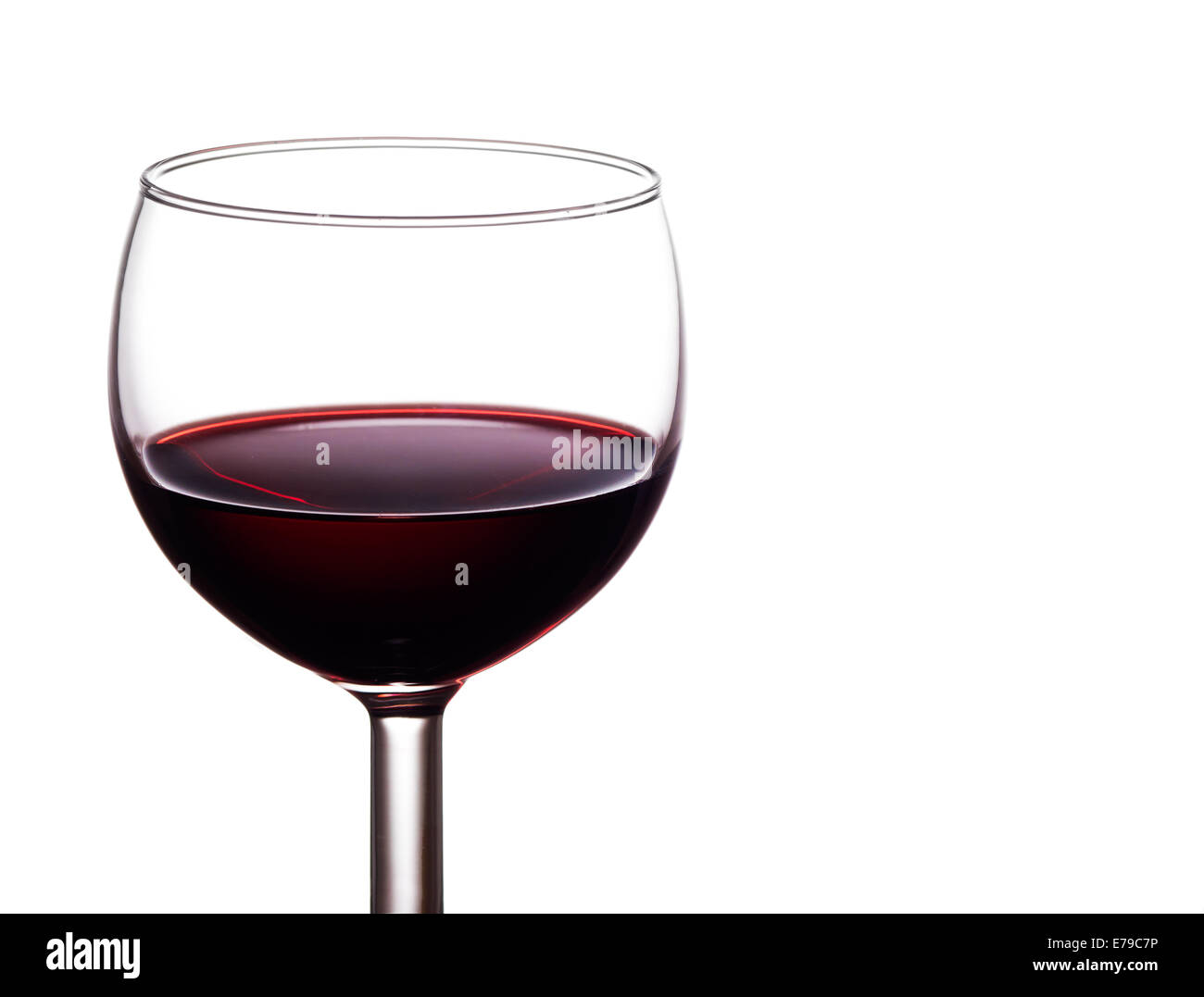 Smooth and tasty. Red wine detail isolated on white. Stock Photo