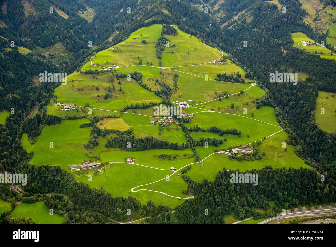 Aerial view, alpine meadows with serpentine roads, Höf, Salzburg, Austria Stock Photo