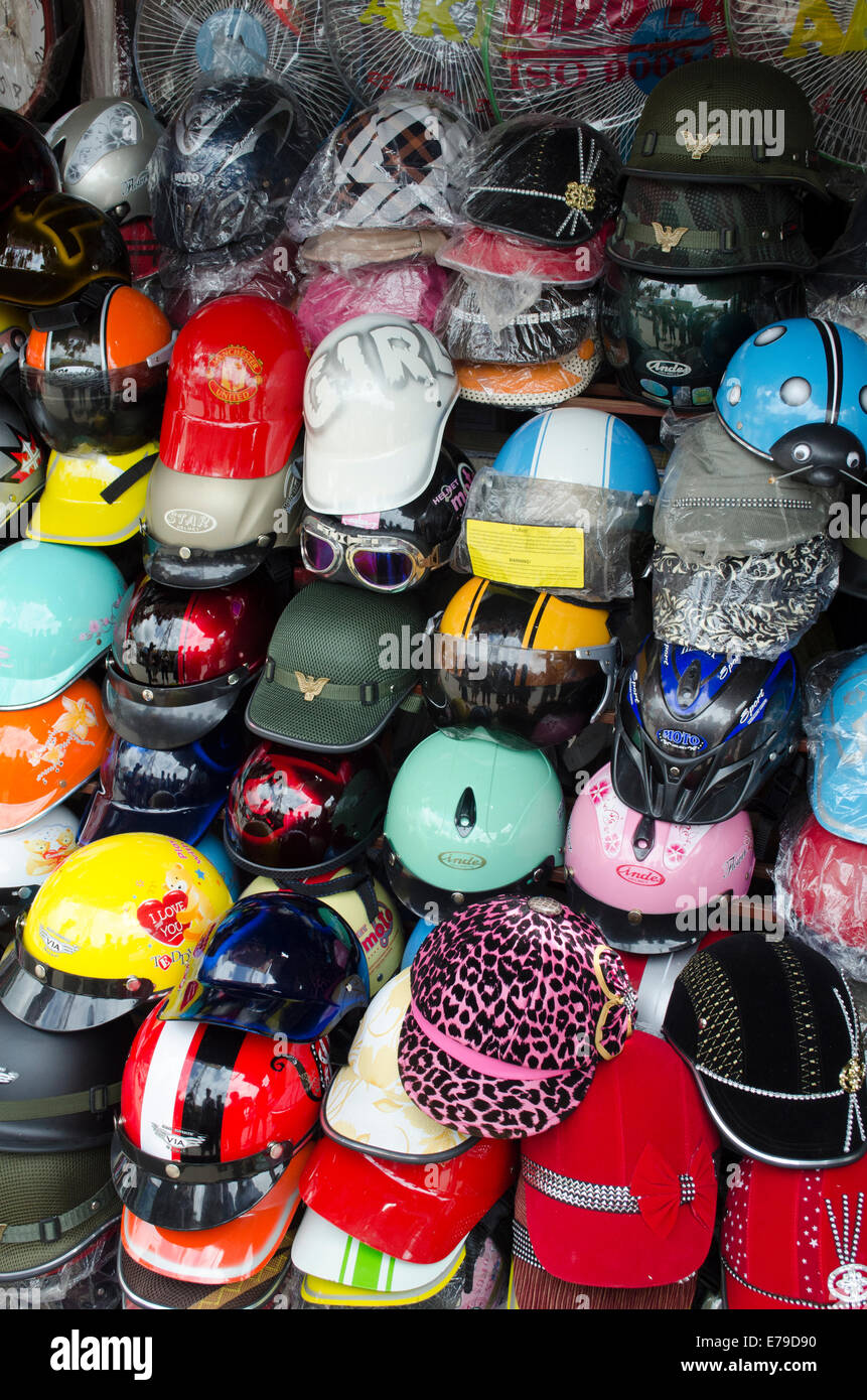 Motorcycle helmets on sale at a local market near Ho Chi Minh Stock Photo: 73352076 - Alamy