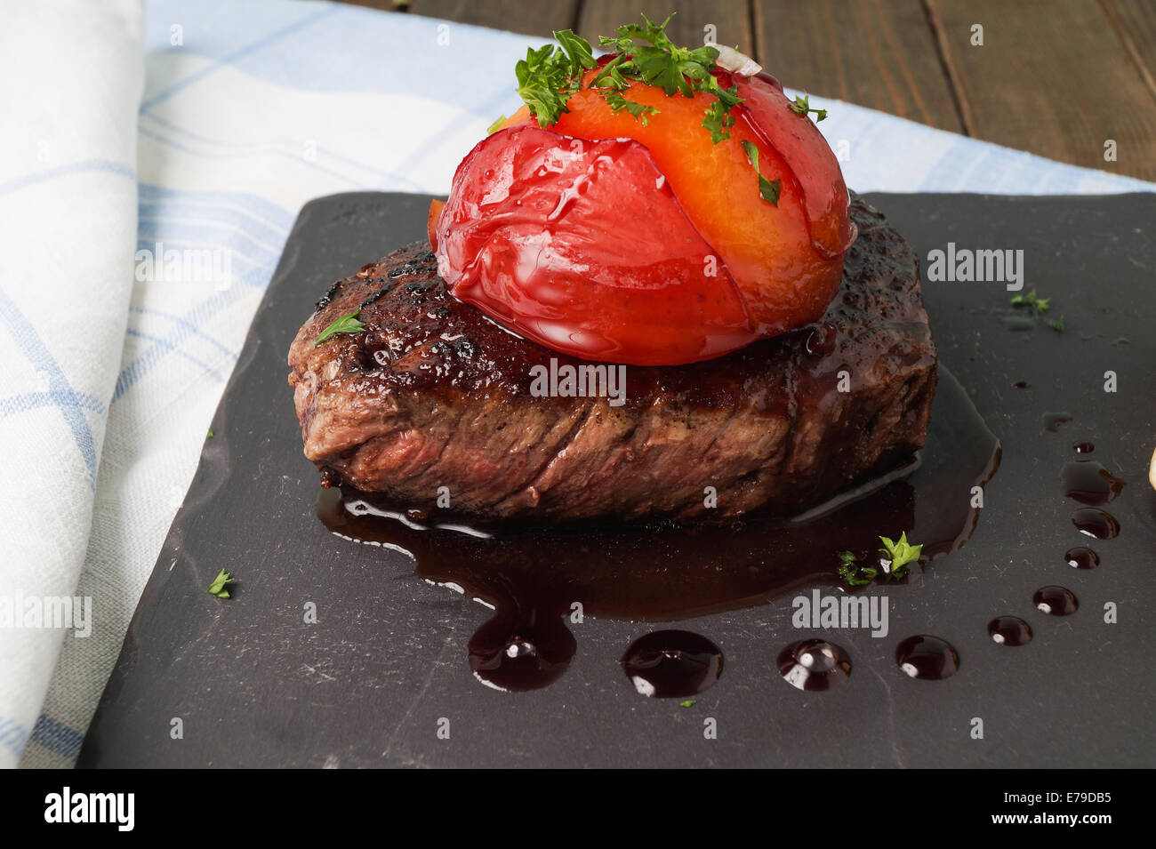 Sirloin Steak with red wine cooked plum Stock Photo Alamy