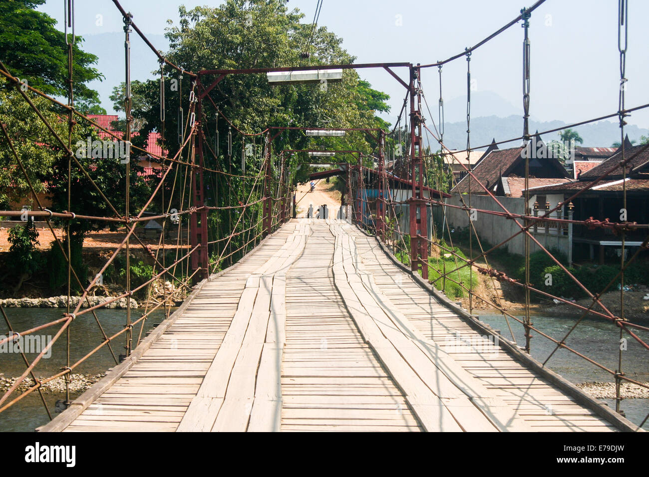 The bridge that connects Vang Vieng to the rural region. Stock Photo