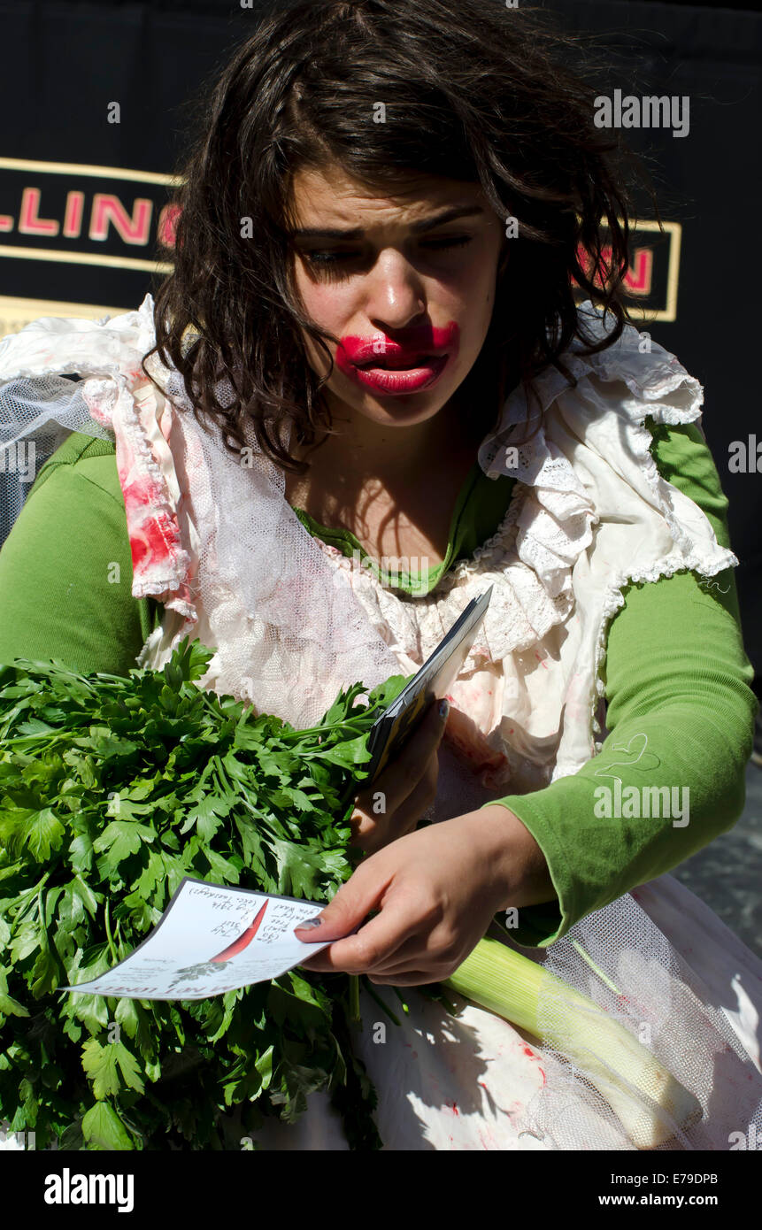 Woman with messy lipstick promoting a show at the annual Festival