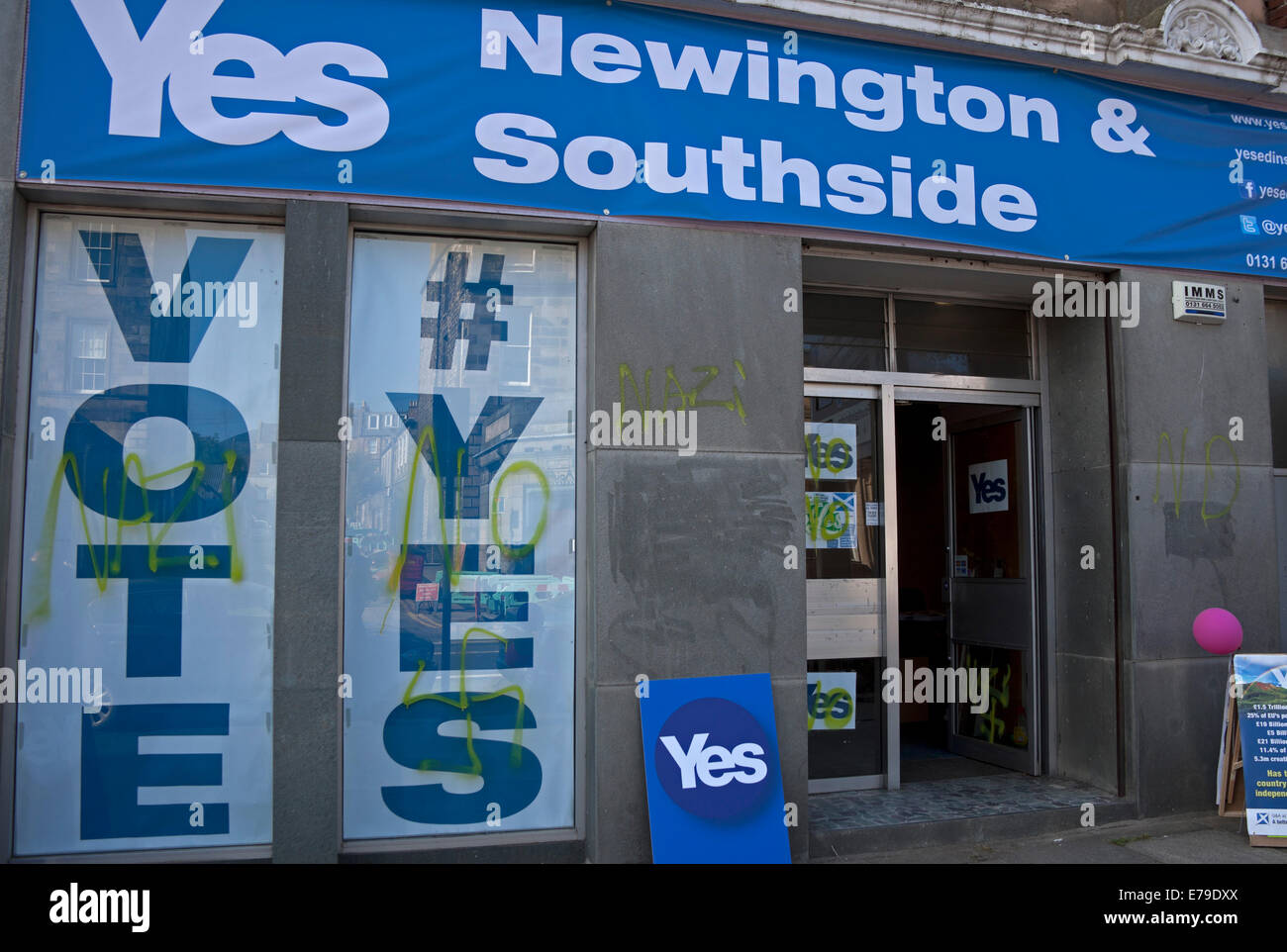 Edinburgh, Scotland,UK. 10th Sept. 2014. Independence Referendum, shop for Yes campaign daubed with nazi swastika and no slogans, in Newington, the premises were only opened yesterday at 3pm. Stock Photo