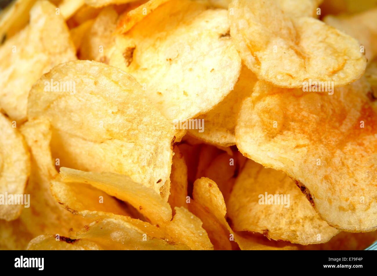 Potato chips, Unhealthy fried snack, Close up Stock Photo Alamy