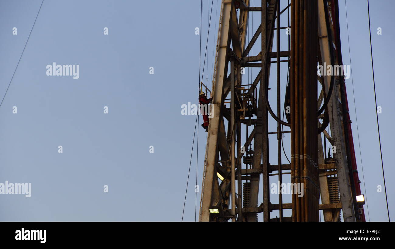 Worker on a oil rig. Stock Photo