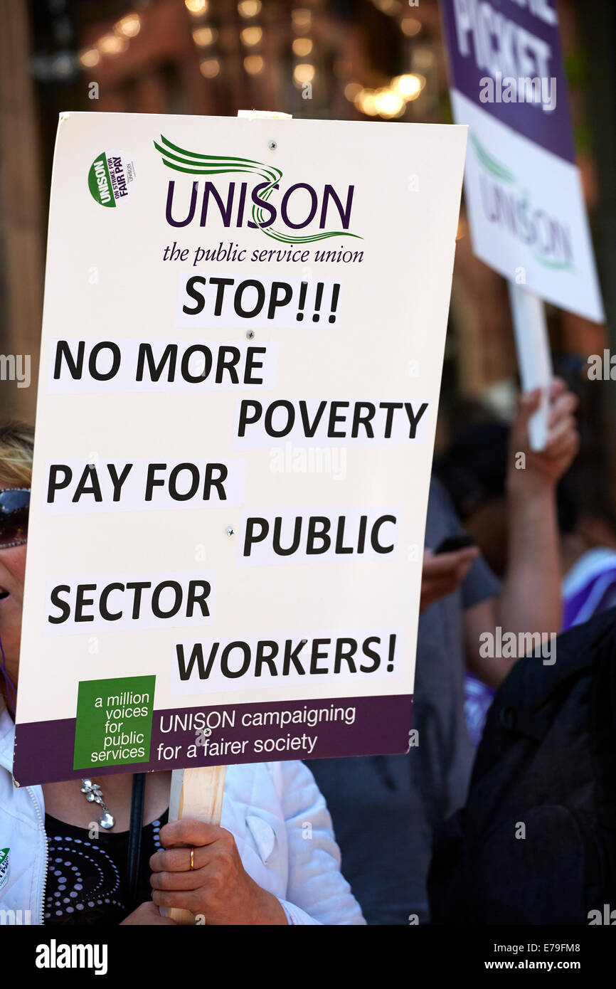 Woman holding unison protest board Stock Photo
