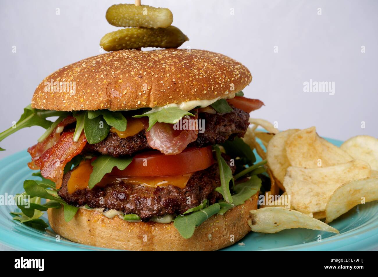 Juicy big bacon and cheese burger meal Stock Photo - Alamy
