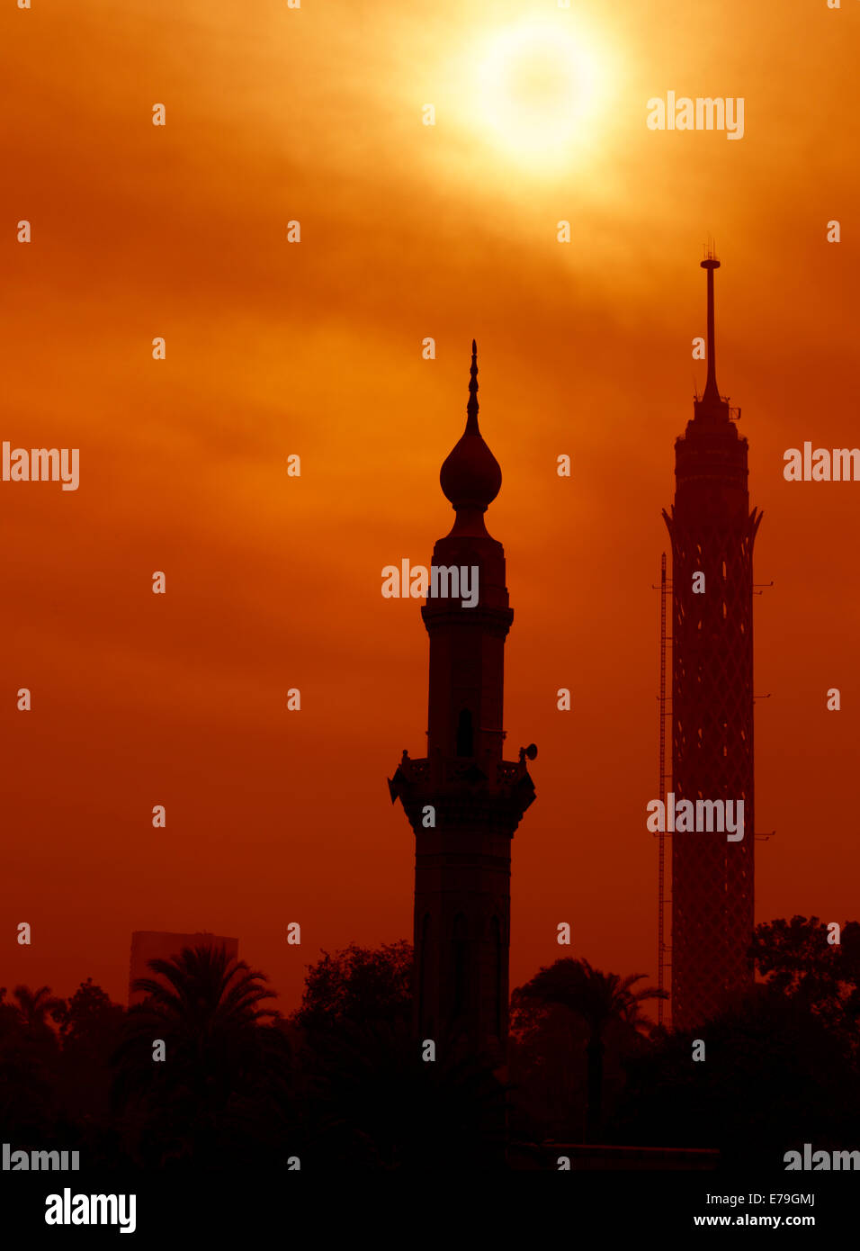 The Cairo Tower and a minaret on Gezira Island Stock Photo