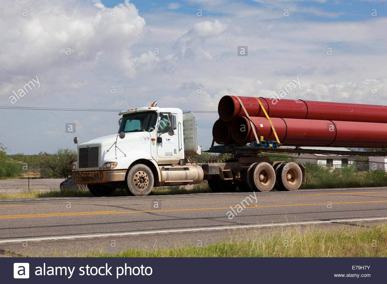 Truck hauling steel pipe for natural gas pipeline Arizona ...