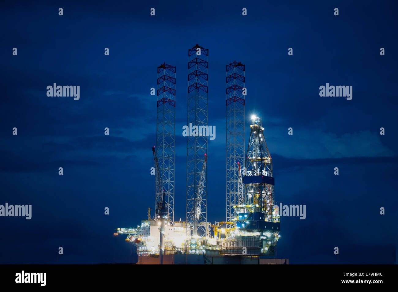 Oil rig at sea in night Stock Photo