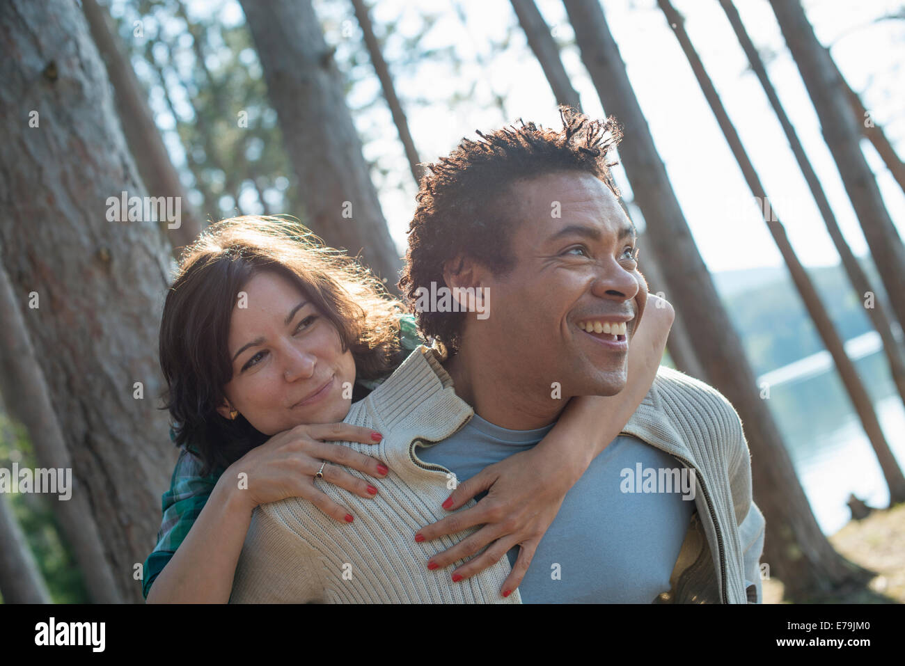 Back view three women hugging hi-res stock photography and images - Alamy
