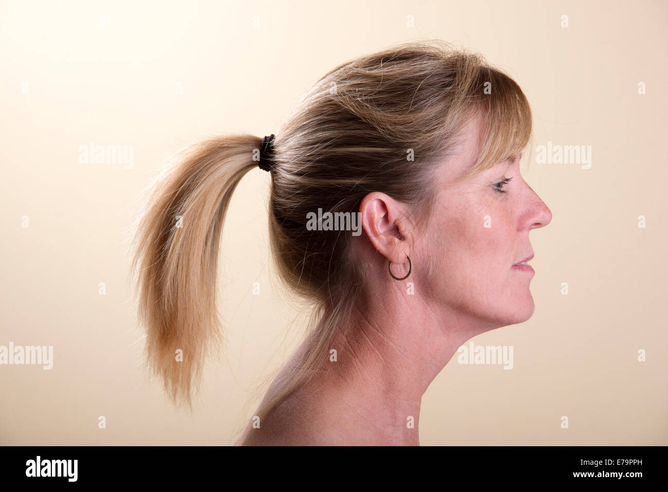 Hair tied back hi-res stock photography and images - Alamy