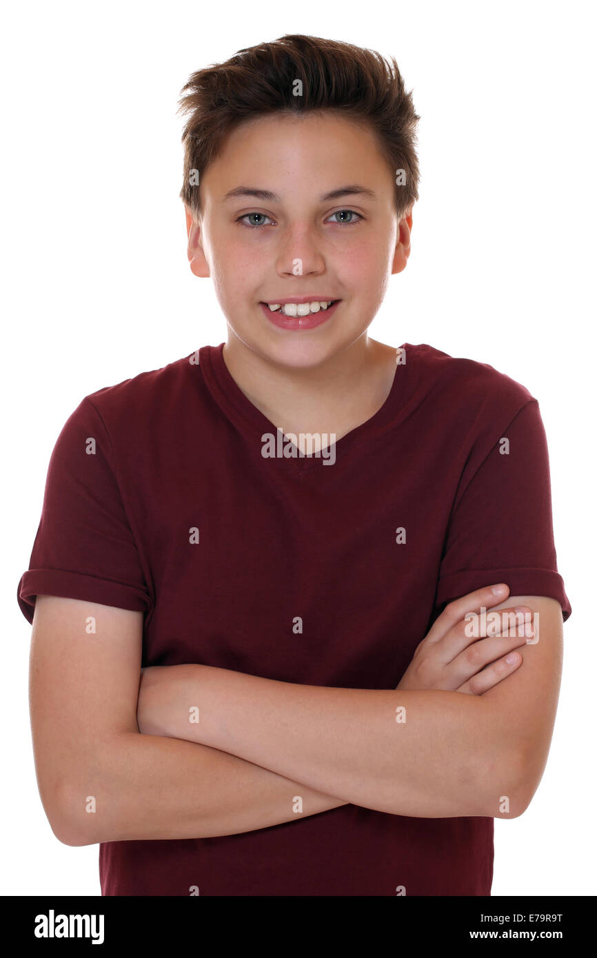 Young teenager boy portrait with folded arms, isolated on a white background Stock Photo