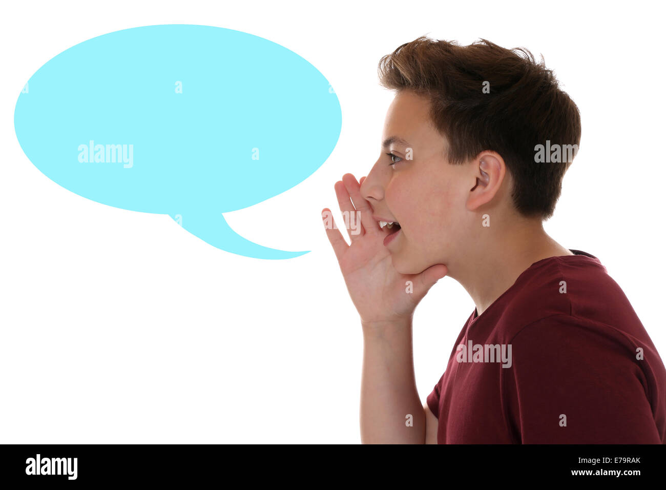 Young boy shouting with speech bubble and copyspace isolated on a white background Stock Photo