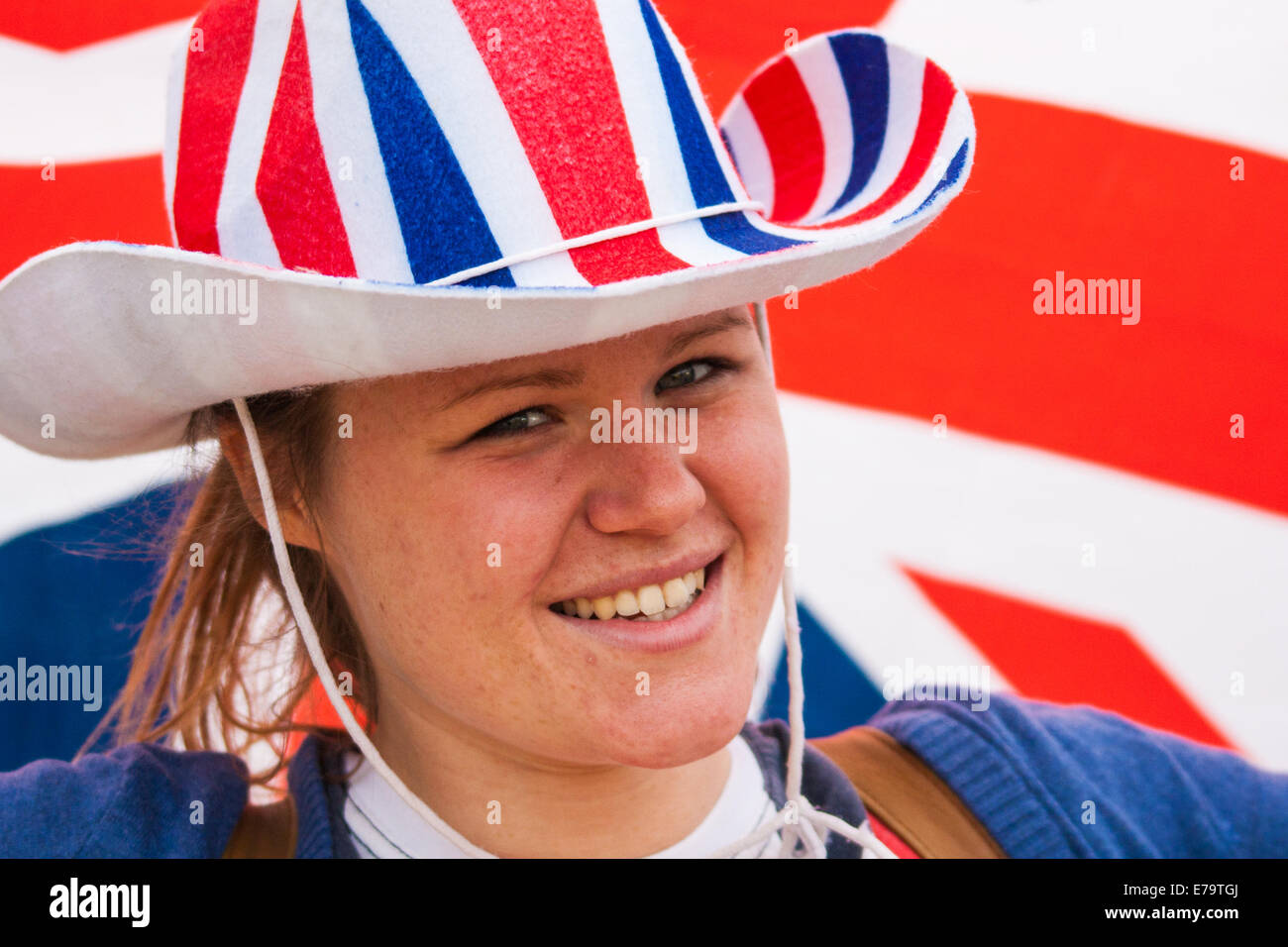 Queen Elizabeth Olympic Park, London, UK. 10th Sep, 2014. Patriotic Liv McCarron queues to get into the opening ceremony for the Invictus Games, where over 400 competitors from 13 nations will take part in an international sporting event for wounded, injured and sick Servicemen and women. Credit:  Paul Davey/Alamy Live News Stock Photo