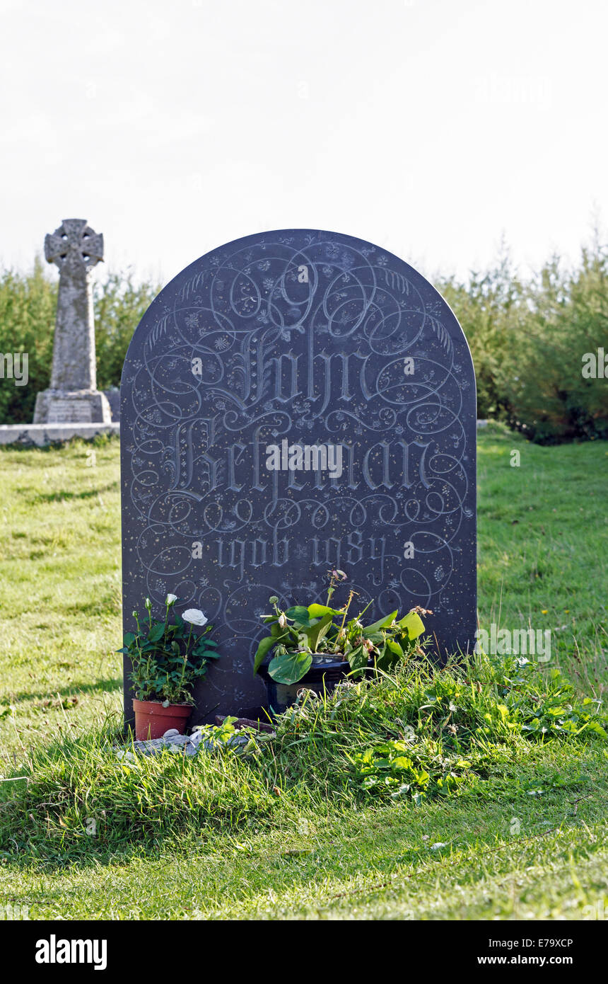 The head stone at the grave of Sir John Betjeman at St.Enodoc church, Trebetherick, Cornwall, UK Stock Photo