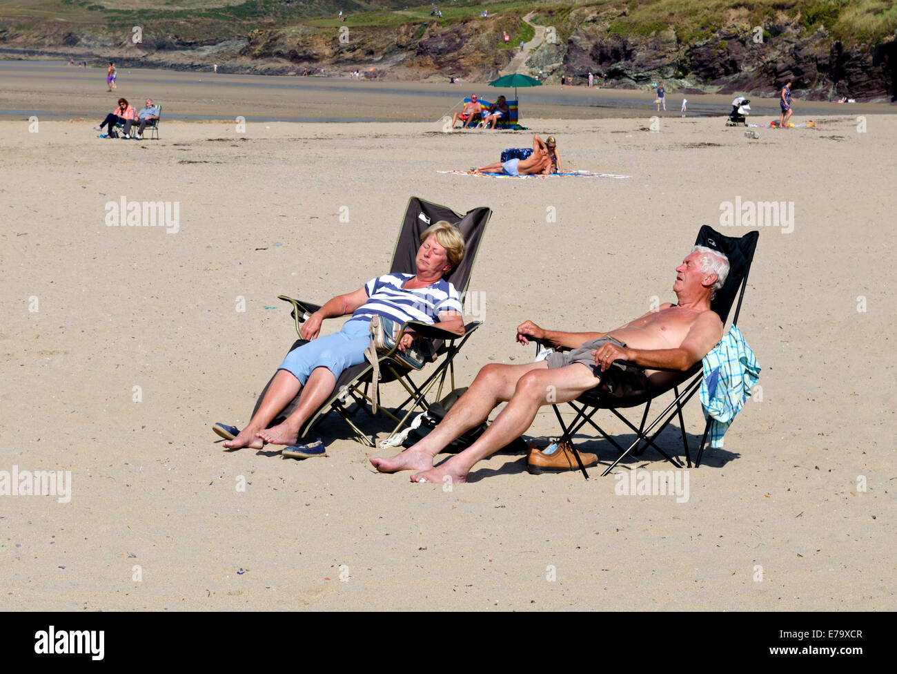 sunbathing on summerleaze beach in Bude, Cornwall, UK Stock Photo
